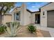 Close-up of the front of a home with desert landscaping and shuttered window at 3717 Rocklin Peak Ave, North Las Vegas, NV 89081
