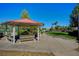 Charming gazebo with benches providing a shady spot for relaxation within the community at 3717 Rocklin Peak Ave, North Las Vegas, NV 89081