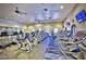 Well-equipped gym featuring modern treadmills, exercise bikes, and wall-mounted TVs at 3717 Rocklin Peak Ave, North Las Vegas, NV 89081