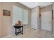 Neutral hallway with stylish decor and tiled floors at 3717 Rocklin Peak Ave, North Las Vegas, NV 89081