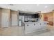Spacious kitchen featuring granite countertops, dark cabinetry, and stainless appliances at 3717 Rocklin Peak Ave, North Las Vegas, NV 89081