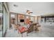 Open living space with access to the kitchen, backyard, and plenty of natural light at 3717 Rocklin Peak Ave, North Las Vegas, NV 89081