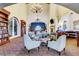 Relaxing lounge area with comfortable seating, bookshelves, and fireplace at 3717 Rocklin Peak Ave, North Las Vegas, NV 89081