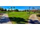 Expansive green park featuring walking paths and a covered picnic area, perfect for outdoor enjoyment at 3717 Rocklin Peak Ave, North Las Vegas, NV 89081