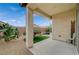 Inviting covered patio featuring a charming cactus garden and decorative touches at 3717 Rocklin Peak Ave, North Las Vegas, NV 89081