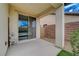 This covered patio offers a comfortable outdoor space with seating and easy access to the yard at 3717 Rocklin Peak Ave, North Las Vegas, NV 89081