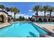 Beautiful community pool with clear blue water and ample deck space for residents to enjoy at 3717 Rocklin Peak Ave, North Las Vegas, NV 89081