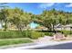 A wide view of a community park called Sage Park with shade structures and beautiful landscaping at 3717 Rocklin Peak Ave, North Las Vegas, NV 89081