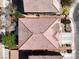 Aerial view highlighting a home's roof and landscaping, offering a comprehensive perspective of the property at 4036 W Bird Man Ln, North Las Vegas, NV 89084