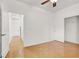 Bright bedroom features a ceiling fan, closet, and neutral walls at 4036 W Bird Man Ln, North Las Vegas, NV 89084
