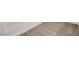 Neutral plush carpeting with a subtle design, perfect for adding warmth to any room at 4036 W Bird Man Ln, North Las Vegas, NV 89084