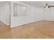 Spacious living room featuring neutral paint and modern flooring, with fan at 4036 W Bird Man Ln, North Las Vegas, NV 89084
