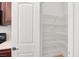 Pantry features adjustable shelving and a convenient door for easy access at 4036 W Bird Man Ln, North Las Vegas, NV 89084
