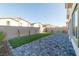 Backyard featuring a patio area and artificial turf at 480 Silverweed Ave, Henderson, NV 89044