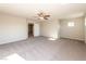 Bedroom featuring a ceiling fan and carpet flooring, with natural lighting at 480 Silverweed Ave, Henderson, NV 89044