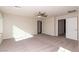 Large bedroom with a ceiling fan and neutral carpeted flooring at 480 Silverweed Ave, Henderson, NV 89044
