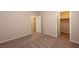 Cozy bedroom with plush carpeting and neutral walls, offering a tranquil retreat at 480 Silverweed Ave, Henderson, NV 89044