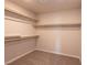 Walk-in closet with built-in shelving for organized storage at 480 Silverweed Ave, Henderson, NV 89044