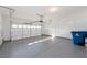 Clean, finished garage with epoxy flooring and automatic door at 480 Silverweed Ave, Henderson, NV 89044