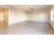 Spacious living room featuring tile floors and natural light at 480 Silverweed Ave, Henderson, NV 89044