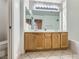 Bathroom featuring a double sink vanity, large mirror, and shower/tub combination at 51 E Agate Ave # 506, Las Vegas, NV 89123