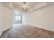 Spacious bedroom with a ceiling fan and large window that allows for plenty of natural light at 51 E Agate Ave # 506, Las Vegas, NV 89123