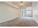 Large bedroom with a ceiling fan and window for plenty of natural light at 51 E Agate Ave # 506, Las Vegas, NV 89123