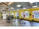 Well-lit gym area with strength training equipment and large windows at 51 E Agate Ave # 506, Las Vegas, NV 89123