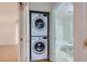 A peek at the in-unit stacked washer and dryer located near the bathroom at 51 E Agate Ave # 506, Las Vegas, NV 89123