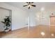 Spacious living room featuring hardwood floors, ceiling fan, and bright, natural light at 51 E Agate Ave # 506, Las Vegas, NV 89123