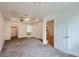 Spacious main bedroom with a ceiling fan, and views of the ensuite bathroom and hallway at 51 E Agate Ave # 506, Las Vegas, NV 89123