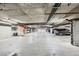 The well-lit, underground parking garage with available parking spots at 51 E Agate Ave # 506, Las Vegas, NV 89123