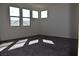 Bedroom featuring carpet, a neutral color scheme, and windows for natural light at 513 Founders Creek Ave, North Las Vegas, NV 89084