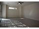 Spacious living room featuring a light-filled atmosphere and tile flooring at 513 Founders Creek Ave, North Las Vegas, NV 89084