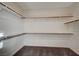 Spacious walk-in closet with ample shelving and rod space, providing plenty of room for storage and organization at 513 Founders Creek Ave, North Las Vegas, NV 89084