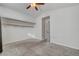 Bedroom with neutral carpeting, closet, and ceiling fan at 540 Viva Serenade Way, Henderson, NV 89015