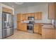 Bright kitchen featuring stainless steel appliances and plenty of cabinets for storage at 540 Viva Serenade Way, Henderson, NV 89015