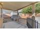 Covered patio with view of the shed and backyard at 540 Viva Serenade Way, Henderson, NV 89015