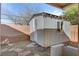 Outdoor shed with a single door and window offering additional storage space at 540 Viva Serenade Way, Henderson, NV 89015