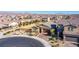 Well-placed home in a suburban neighborhood boasting manicured landscaping and tile roofing at 5648 Vermillion Ridge St, North Las Vegas, NV 89031