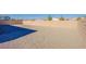 Spacious backyard with gravel, perfect for customization and landscaping at 5648 Vermillion Ridge St, North Las Vegas, NV 89031