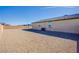 Large gravel backyard space offers low maintenance and customizable outdoor living at 5648 Vermillion Ridge St, North Las Vegas, NV 89031