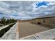 Spacious backyard with rock landscaping and privacy wall, creating an outdoor oasis at 5648 Vermillion Ridge St, North Las Vegas, NV 89031