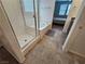Bright bathroom featuring a walk-in shower and a soaking tub at 5648 Vermillion Ridge St, North Las Vegas, NV 89031