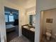 Bathroom with double sink vanity and a separate toilet room at 5648 Vermillion Ridge St, North Las Vegas, NV 89031