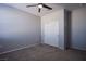 Neutral bedroom with carpet and a closet with sliding doors, providing a calm and inviting space at 5648 Vermillion Ridge St, North Las Vegas, NV 89031