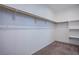 Walk-in closet with ample shelving and rod space, providing generous storage solutions at 5648 Vermillion Ridge St, North Las Vegas, NV 89031