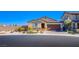 Charming one-story home features a two-car garage, stone accents, and desert-friendly landscaping at 5648 Vermillion Ridge St, North Las Vegas, NV 89031