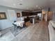 Bright and airy living area with open concept kitchen, dining area, and abundant natural light at 5648 Vermillion Ridge St, North Las Vegas, NV 89031