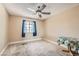 This bedroom features neutral walls, carpet, a window, and is ready for your personal touch at 5775 W Desert Inn Rd, Las Vegas, NV 89146